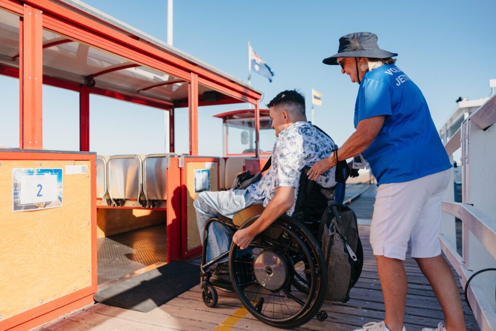 Wheelchair passenger boarding the Busselton Jetty Train using an accessible ramp