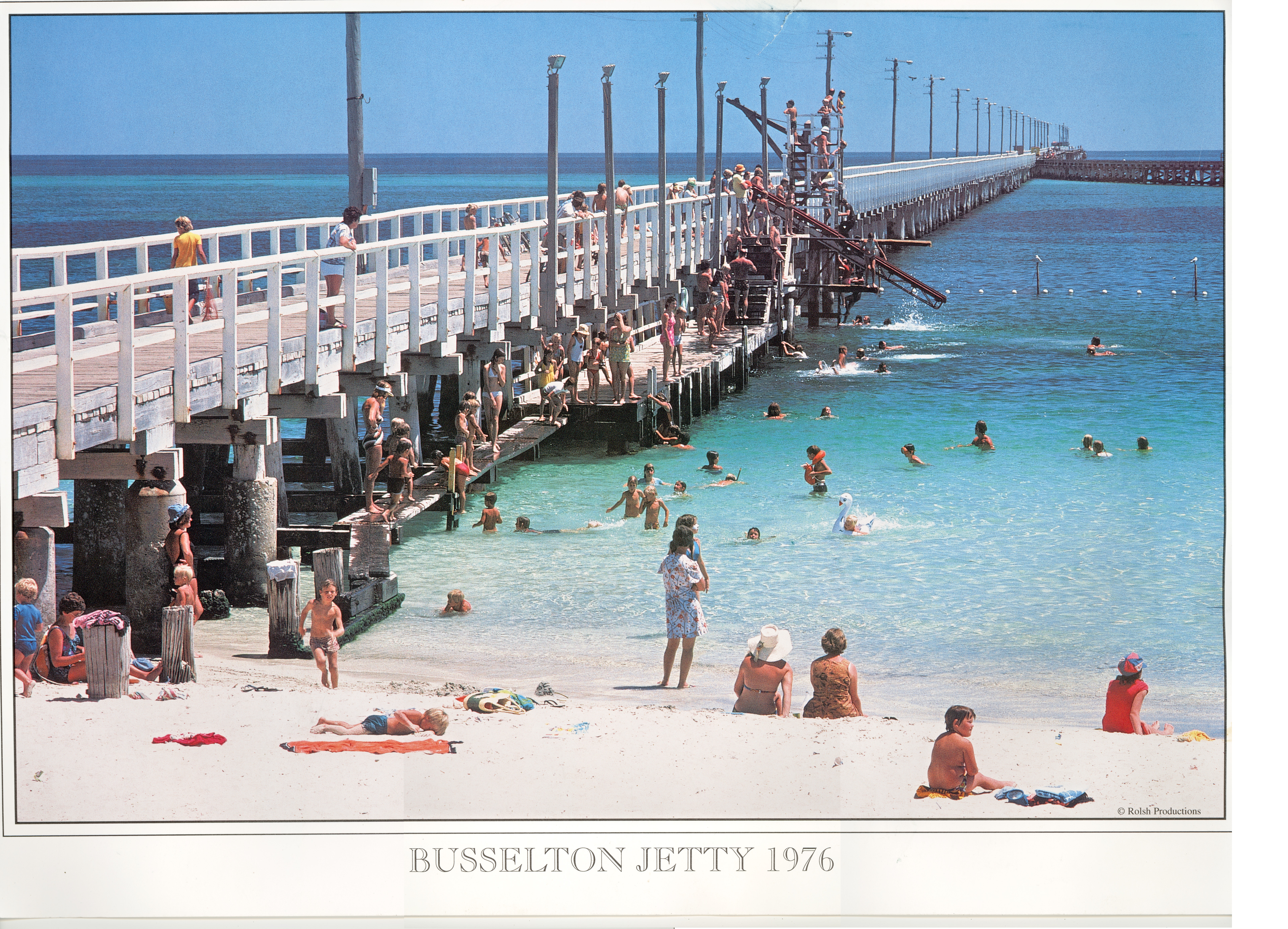 1976 - Kids and Adults alike jumping off the Jetty and using the old Jetty slide.